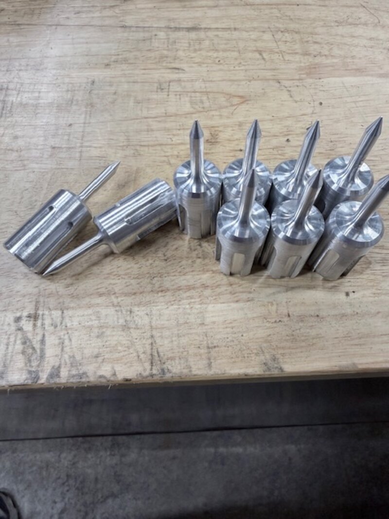 Batch of precision machined golf divot repair tools