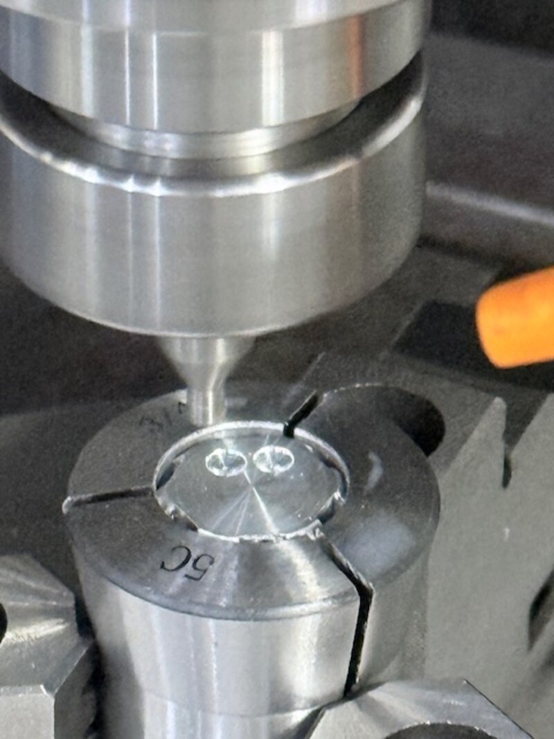 Close-up of mill tapping a part