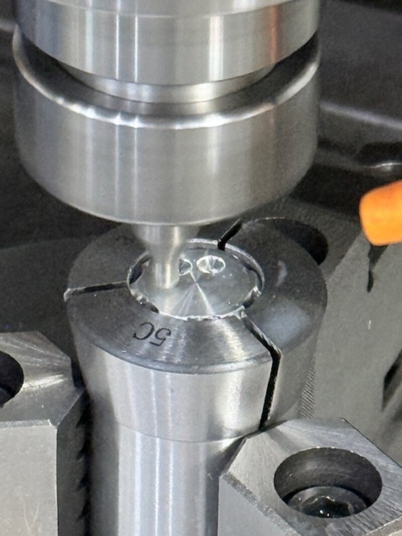 CNC mill running with coolant