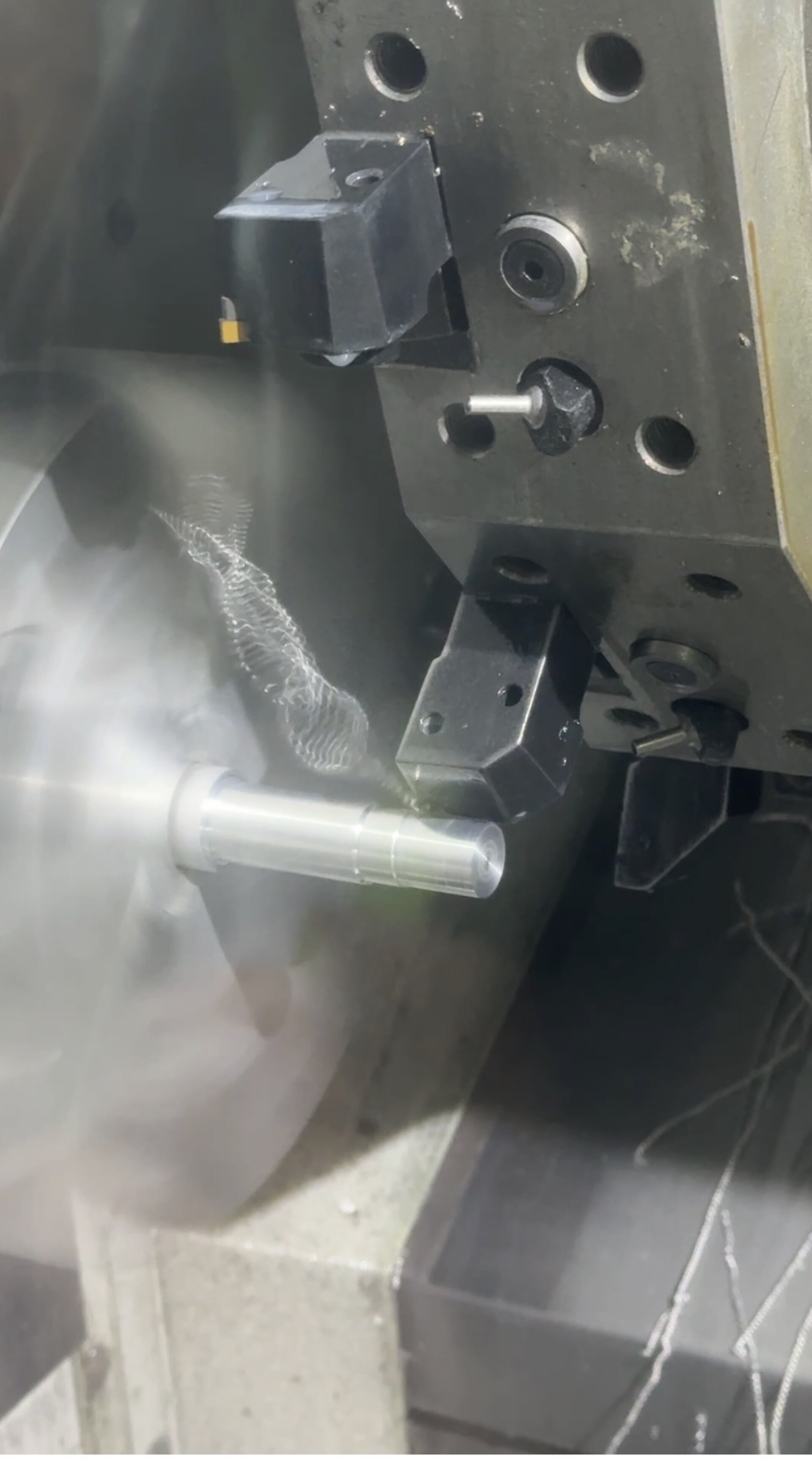 CNC lathe turning a precision part